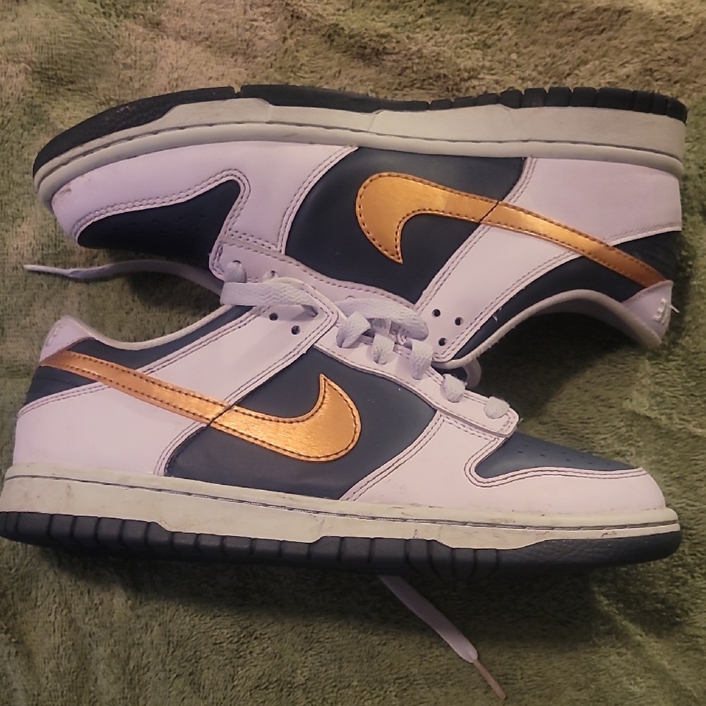 Nike White, Navy Blue, and Gold Athletic Shoes